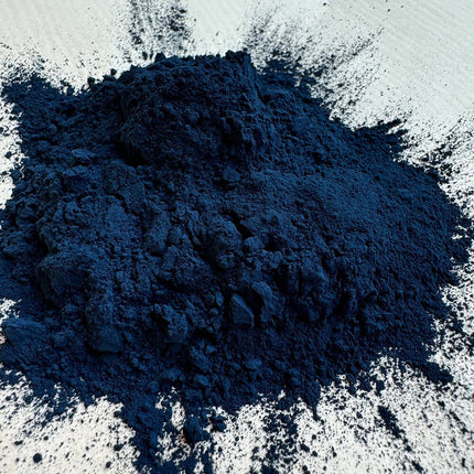 Close-up of indigo powder on a white background